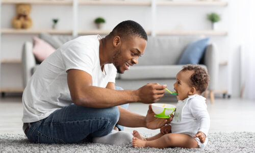 Father's,Care.,Loving,Black,Dad,Feeding,His,Cute,Baby,Son